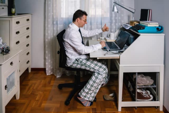 While working from home, it's important to dress as if you were going to the office. Don't stay in your pajamas, like this guy.